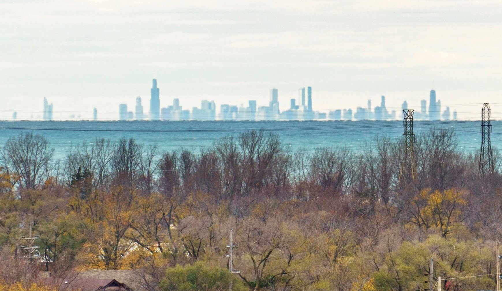 Sunset view of the Chicago skyline across Lake Michigan from the Indiana shore